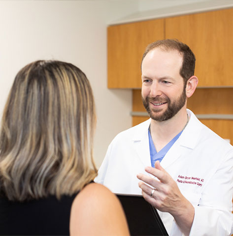 Dr. Weinfeld with a patient